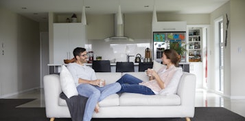 A couple Relaxing in their House