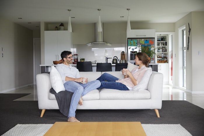 A couple Relaxing in their House